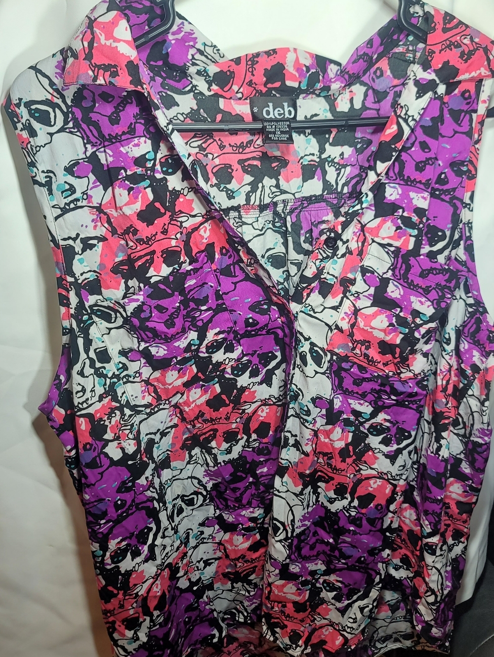 Deb - Sleeveless V-Neck in White, Purple, Pink & Black Skull Print